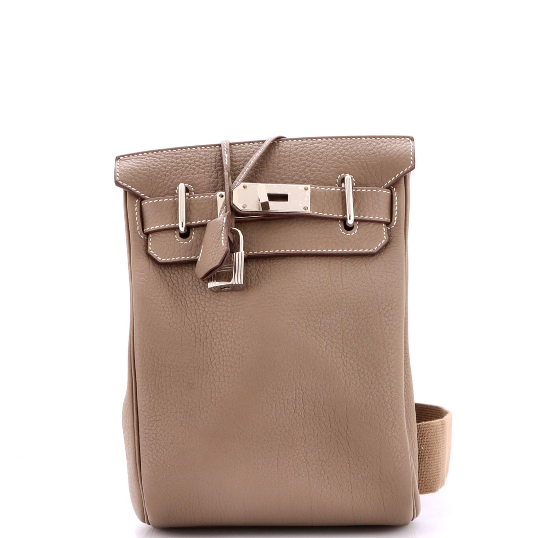 Hermes Hac a Dos Backpack Togo: The Hac a Dos backpack in Togo, 7 in wide by 11 in high by 3 in deep. Vertical, slim, and one of the few Hermes shapes that solves a genuine practical problem. Grade B - Excellent. Maison de Beaubigon