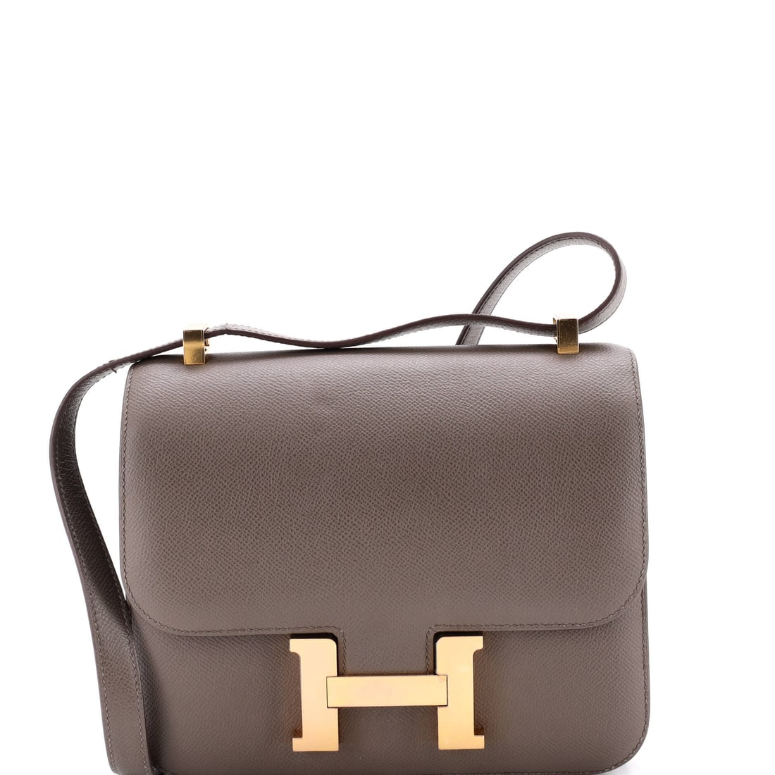 Hermes Constance Bag Epsom: A Constance in Epsom at 9 in wide, 8 in high and 3 in deep, with a 10 in handle drop and 17 in strap. Capacity, flat geometry and a clasp that identifies the bag from across a room. Grade C - Very Goo