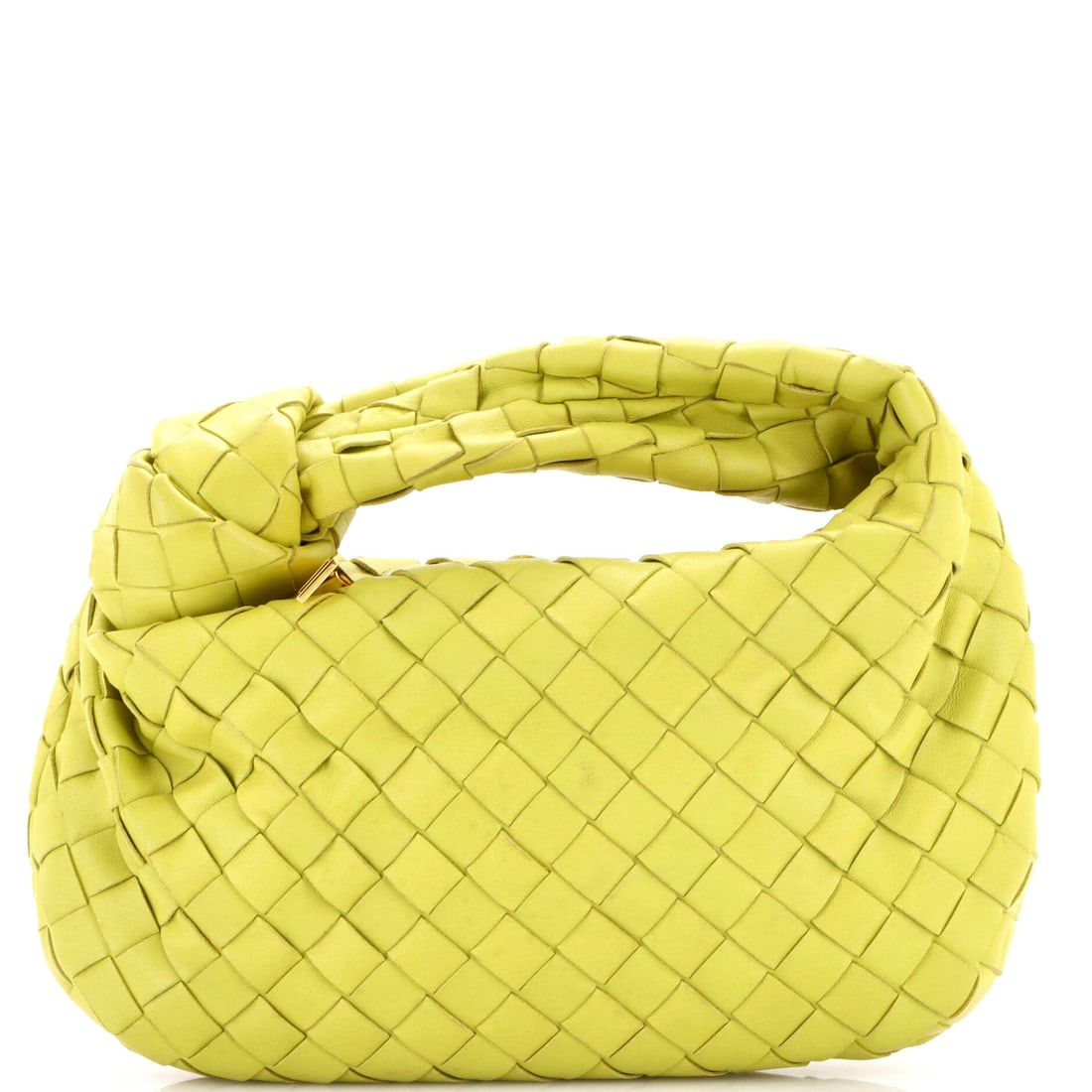 Bottega Veneta BV Jodie Hobo Intrecciato Nappa: Knotted at the top and unstructured everywhere else, the Jodie Mini behaves less like a handbag than like a leather pouch that happens to have a handle. That handle is the tell: the knot is formed fro