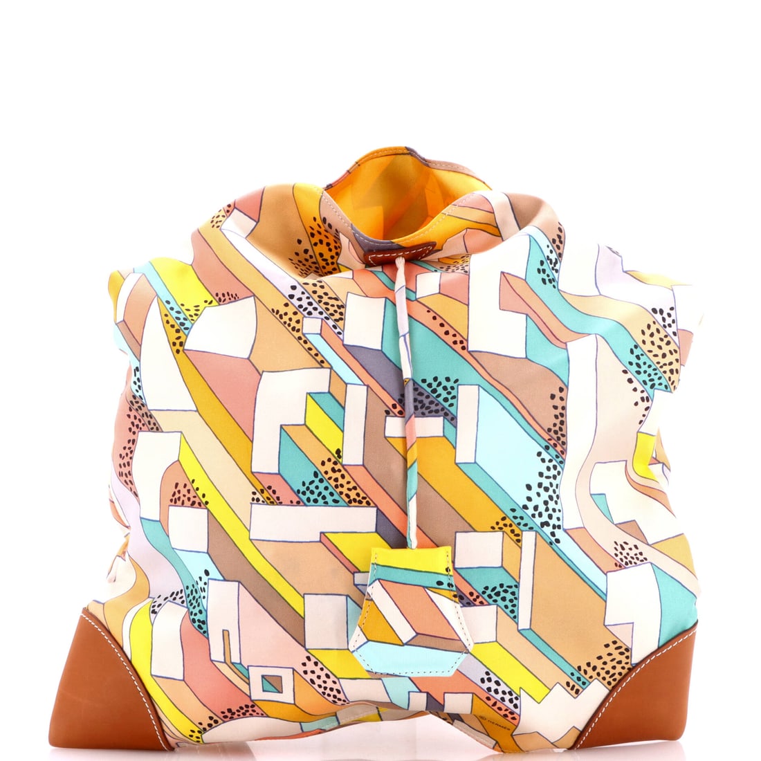 Hermes Silky City Bag Printed Silk and Leather: Printed silk is the variable to inspect here, because unlike leather it does not patinate evenly, it thins at contact points and it holds colour differently where light has reached it. This Silky City