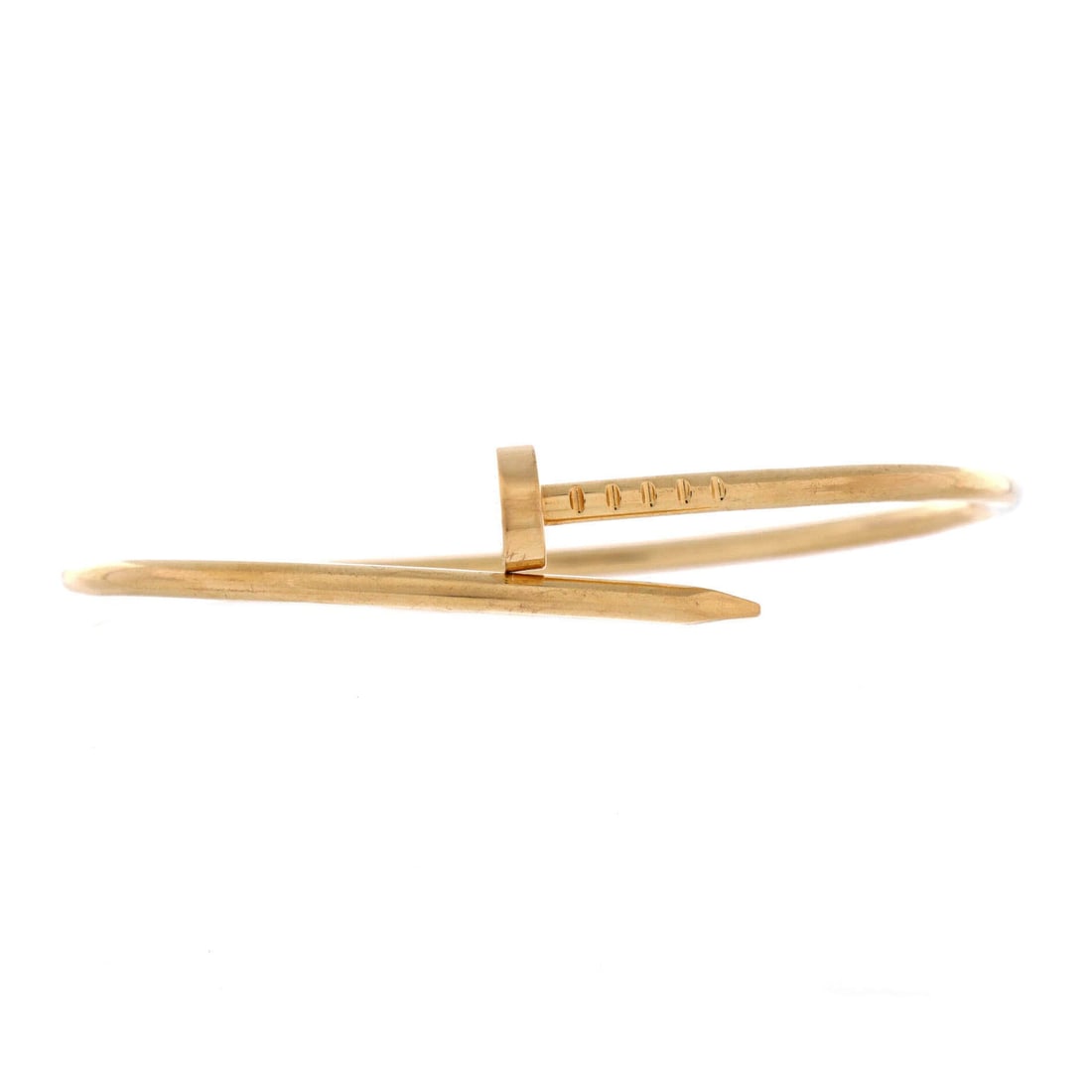 Cartier Juste un Clou Bracelet 18K Yellow Gold: Slim, rigid and open at the front, this yellow gold bracelet reads as jewelry from a distance and as a Cartier signature up close. It sits well alone and better in a stack, which is how most of these 
