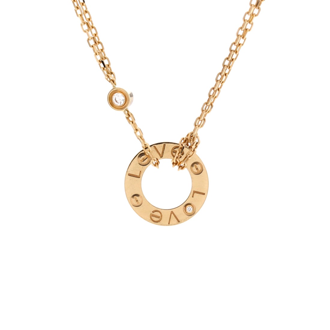 Cartier 2 Diamonds Love Pendant Necklace 18K Yellow Gold and Diamonds: Warm 18K yellow gold, a screw-motif bar and two diamonds make up the Love pendant in its most requested configuration. It reads as jewelry you keep on rather than jewelry you plan around. Grade B - Ex
