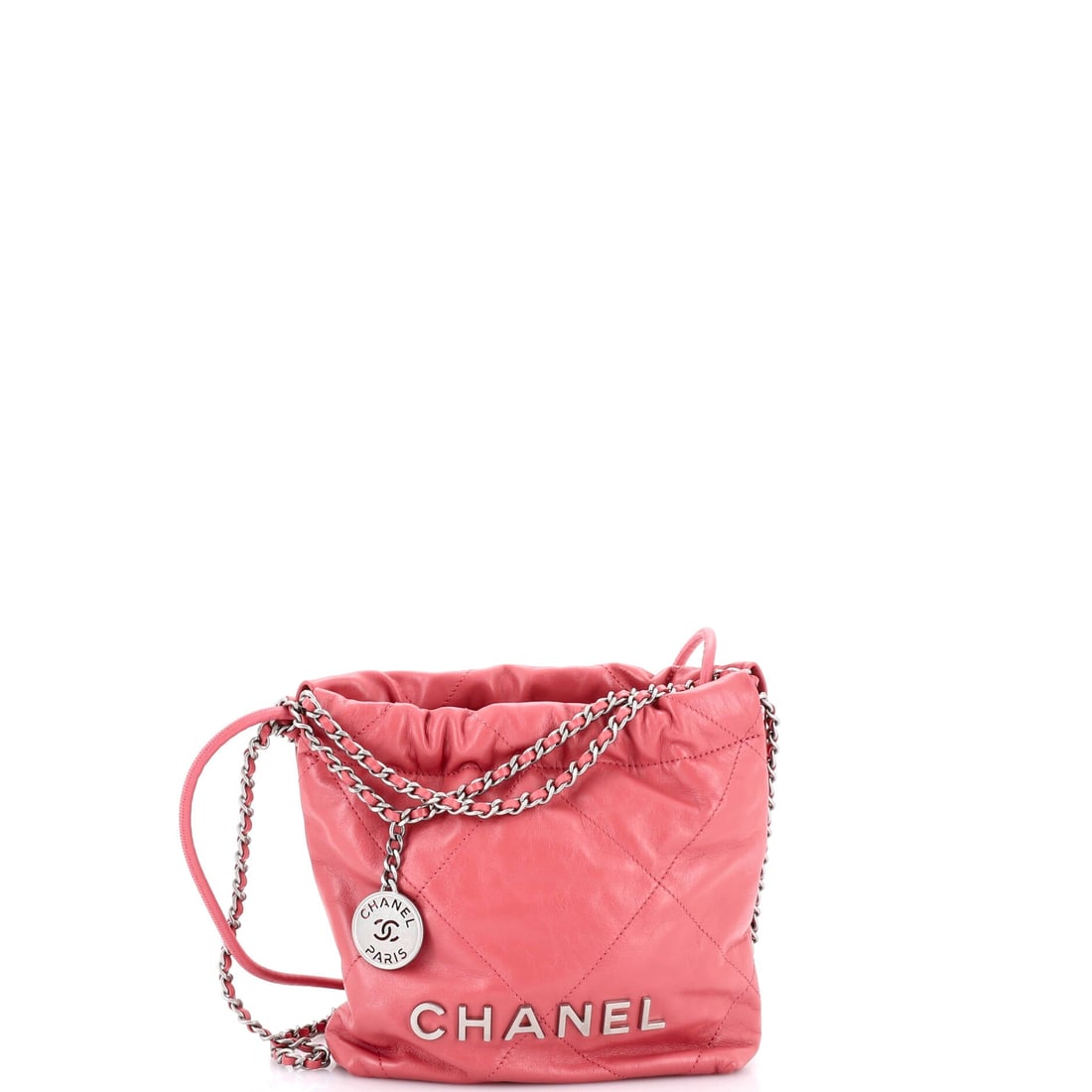Chanel 22 Chain Hobo Quilted Calfskin: Evening use is where the Mini earns its keep, 7 by 7.5 by 2.5 inches with the chain out and nothing inside but a card case and a phone. The gathered top is the whole design idea of the 22, and it surv
