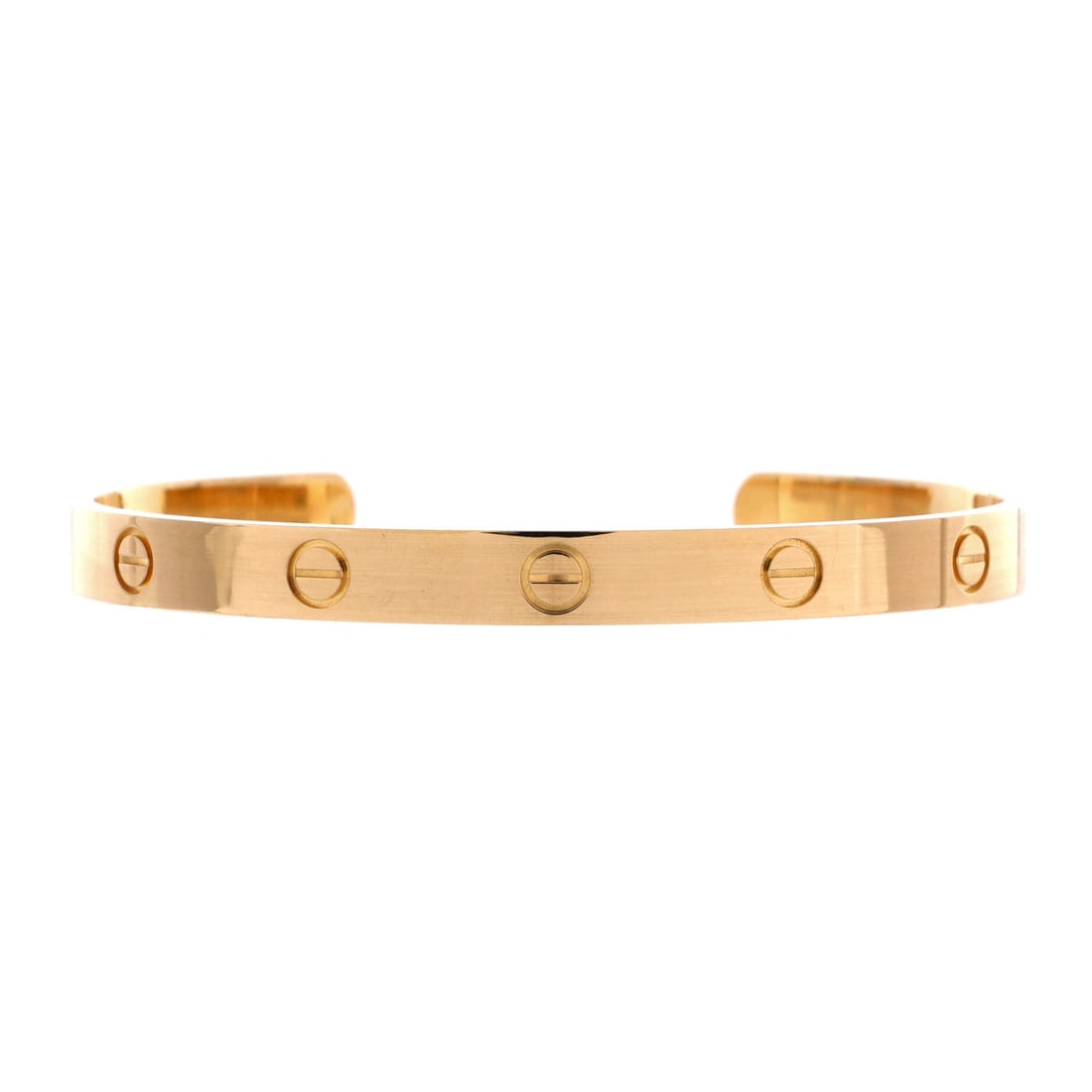 Cartier Love Cuff Bracelet 18K Yellow Gold: The Love cuff swaps the two-piece screw closure for an open back, which makes it the version you can put on alone and take off at the end of the day. In 18K yellow gold it keeps the same screw motif a