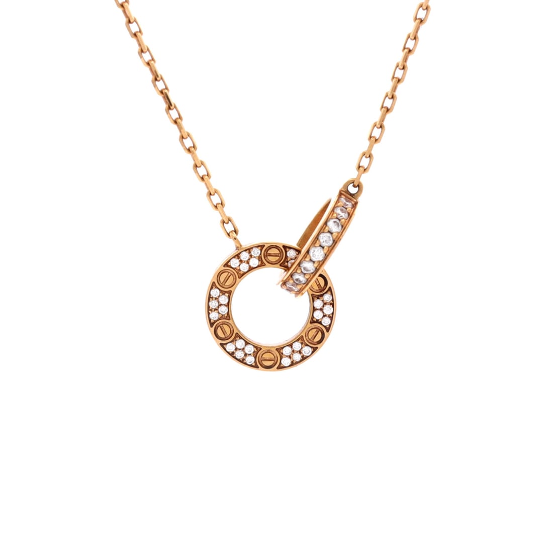 Cartier Love Interlocking Pave Necklace 18K Rose Gold and Diamonds: Fully pave-set across both interlocking rings, this 18K rose gold Love pendant puts diamonds where the polished metal usually sits. Bidders chasing the brighter Love pendants know this is the version 