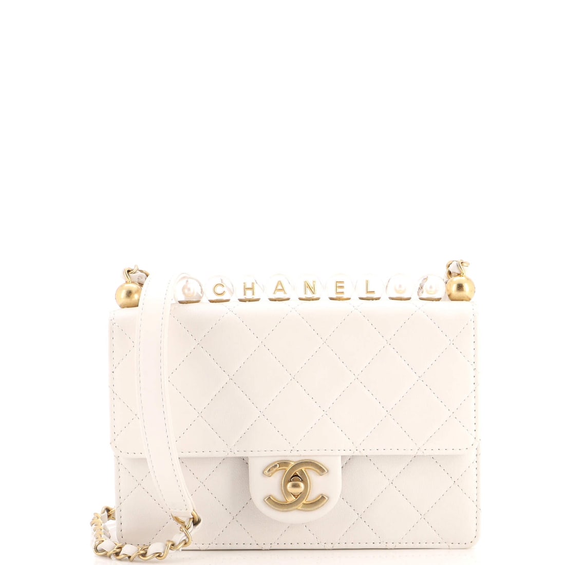 Chanel Chic Pearls Flap Bag Quilted Goatskin with Acrylic Beads: The Small measures 7.5 in across by 6 in high with a 2 in depth, slim through the body because there is no second flap eating interior space. Beaded pearls and quilted goatskin make this a night bag f