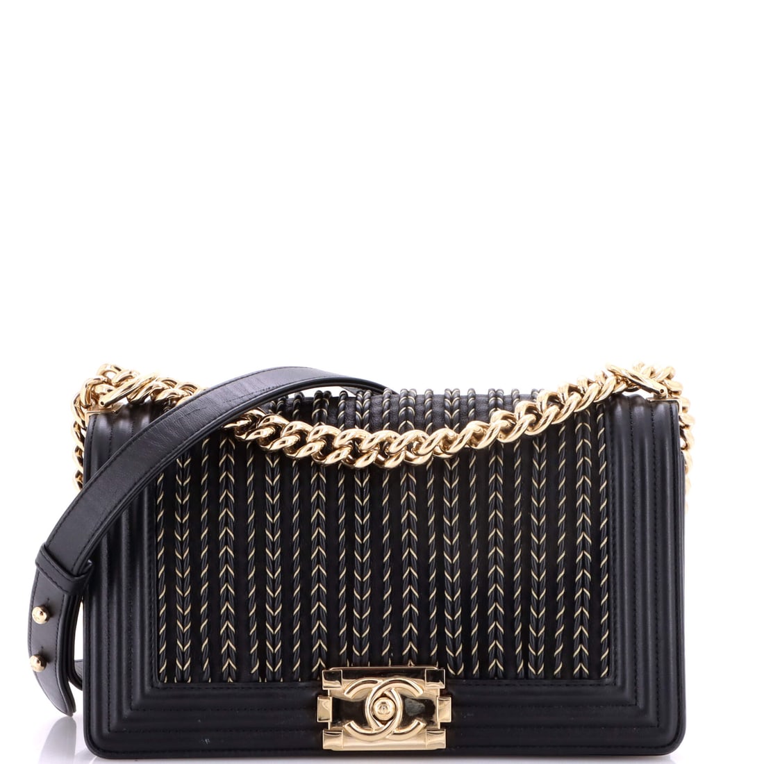 Chanel Boy Flap Bag Braided Woven Lambskin: Braided woven lambskin softens the Boy's hard architecture without giving up the rectangular frame, and the effect works best at Old Medium scale. The bag measures 10 inches wide by 5.5 high with a sl
