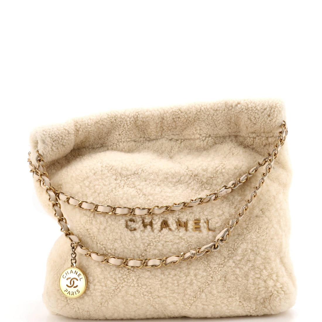 Chanel 22 Chain Hobo Quilted Shearling: The 22 is a drawstring hobo built to slouch, and in shearling that slouch becomes something closer to a pillow. Even as the Small it stands 14 in high on a 12.5 in width with a 3 in depth, so the
