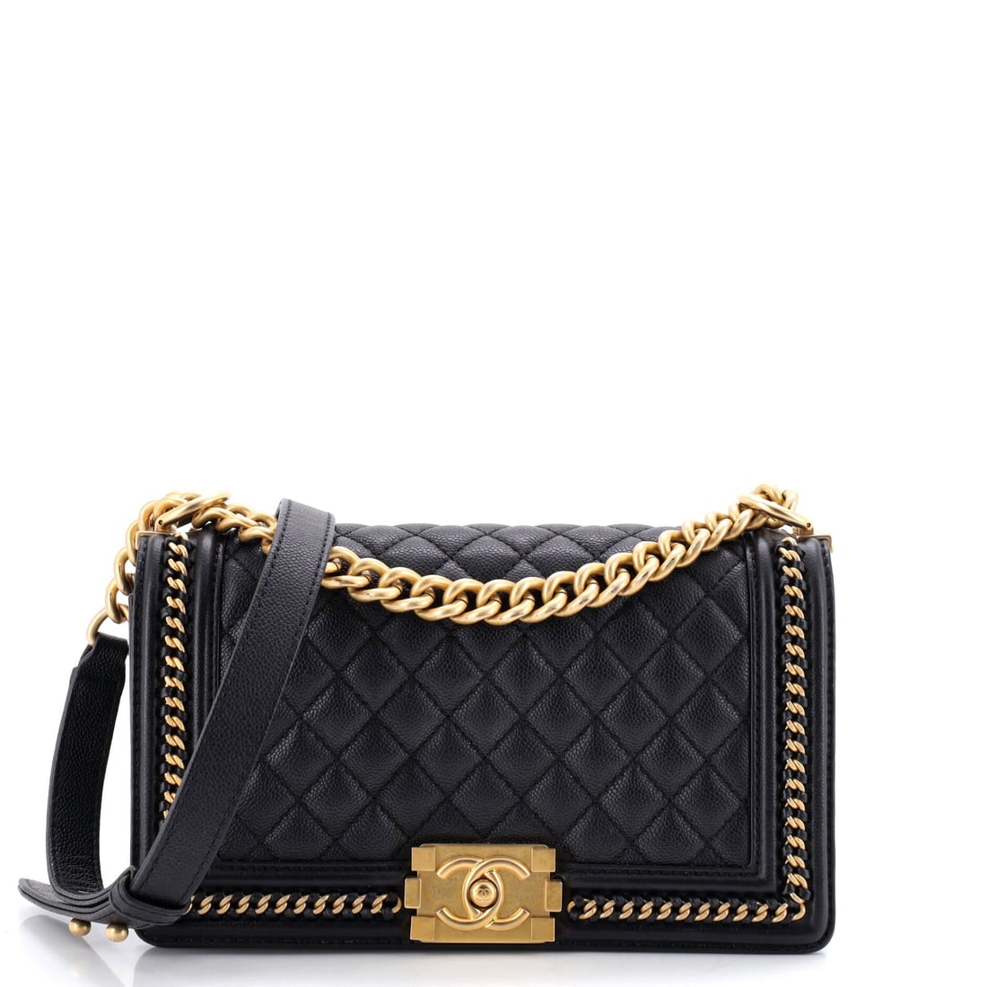 Chanel Boy Flap Bag Quilted Caviar with Whipstitch Chain Detail: Slightly under the usual Old Medium footprint at 9.5 by 5.5 by 3 inches, this Boy reads a touch neater on the shoulder without losing the model's rectangular stance. The whipstitch running through
