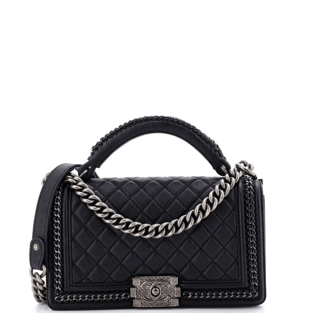 Chanel Chain Handle Boy Flap Bag Quilted Grained Calfskin: The chain handle version of the Boy adds a short top carry to the usual shoulder strap, which changes how the bag is used more than how it looks. Grained calfskin resists the corner rub that plagues