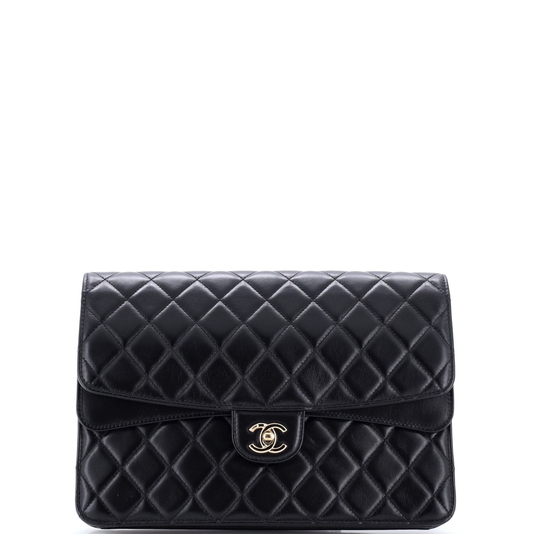 Chanel CC Double Flap Clutch Quilted Lambskin: One inch of depth tells you what this is: a clutch first, built with the double flap construction borrowed from the Classic. The Medium spans 9.5 inches by 6, wide enough for a passport and phone laid