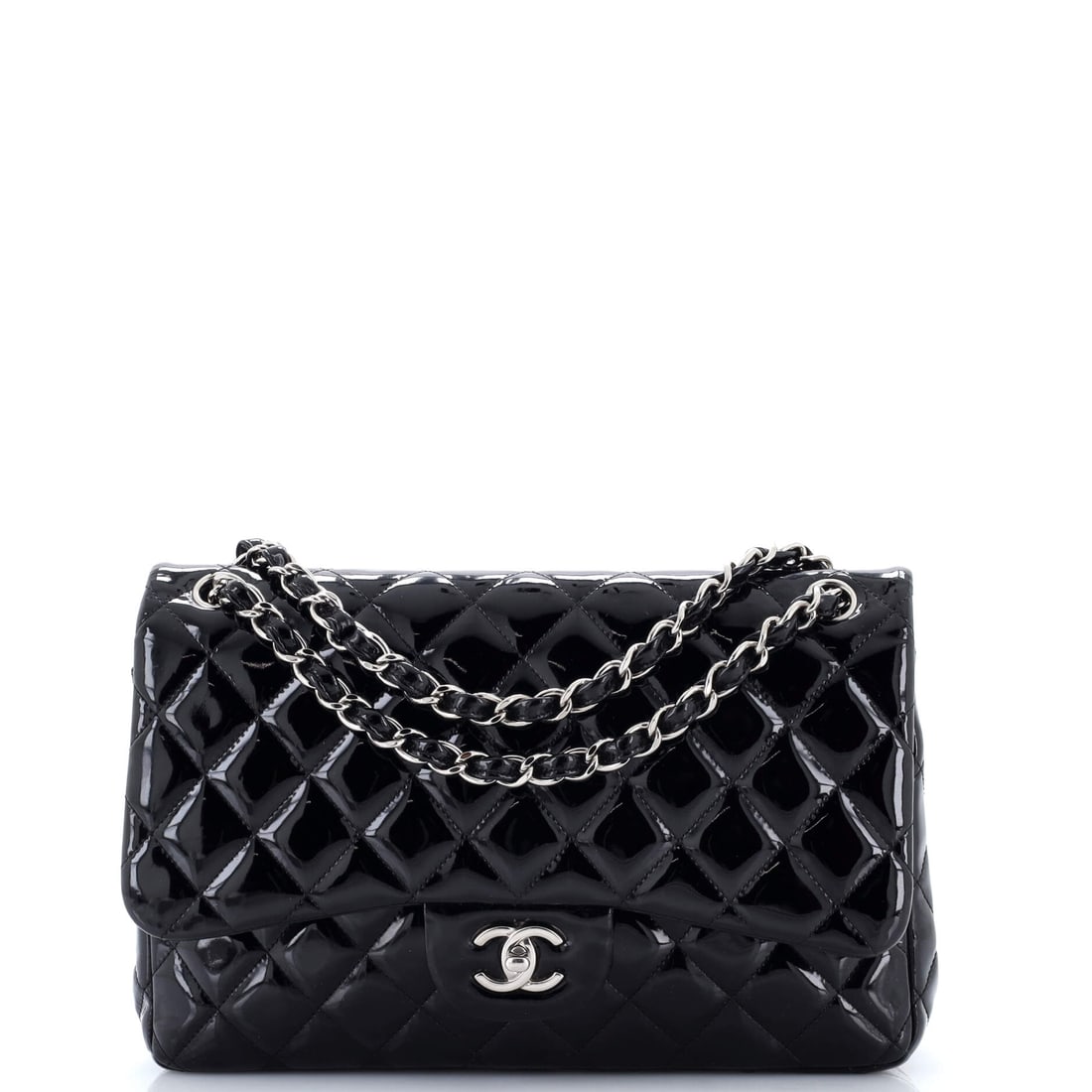 Chanel Classic Double Flap Bag Quilted Patent: Jumbo is where the Classic Flap stops being a decorative object and starts being a bag you pack, and at 11.5 by 8 by 3.5 inches this one has the volume to prove it. Patent holds that larger panel rigi