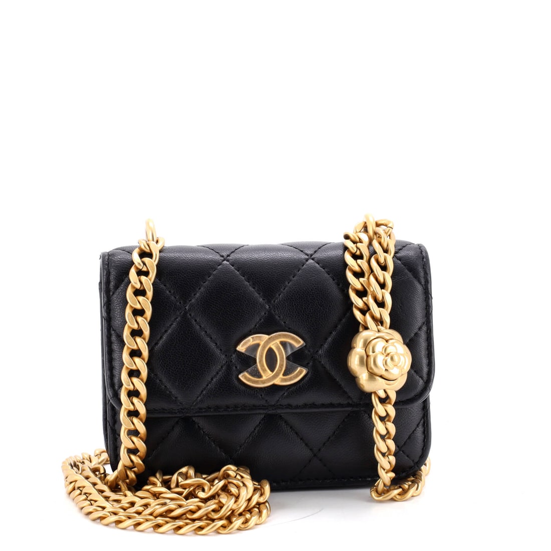 Chanel Sweet Camellia Flap Clutch with Chain Quilted Lambskin: The camellia is Chanel's house flower, and here it works as the closure rather than as decoration applied over one. Mini at 5 by 3.5 by 1.5 inches, quilted lambskin, with a chain long enough to wear a