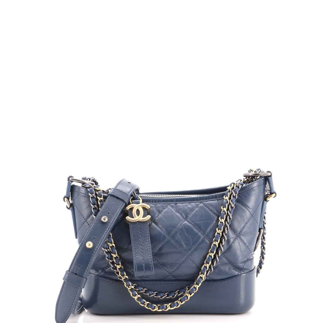 Chanel Gabrielle Hobo Quilted Aged Calfskin: The Gabrielle Hobo's split personality, rigid base and collapsible top, is what makes it read differently from every other Chanel shoulder bag. Small here is 8 by 6 by 3 inches, the size that keeps th