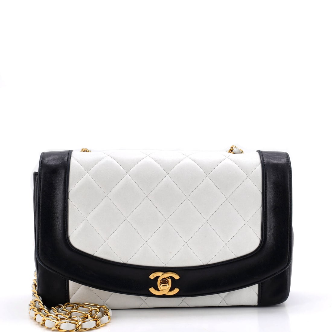 Chanel Vintage Diana Flap Bag Quilted Lambskin: The Diana is the vintage flap collectors reach for when the Classic feels too obvious: same quilted lambskin, simpler hardware, less weight. Medium at 10 by 6.5 by 3 inches gives it everyday capacity.