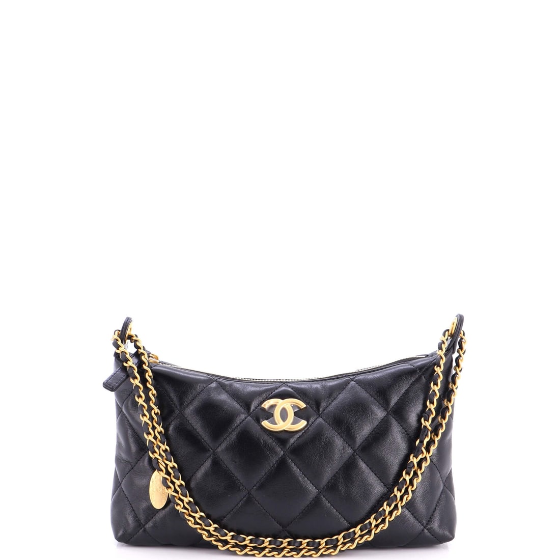 Chanel CC Medallion Hobo Quilted Lambskin: The medallion charm on the strap is the detail collectors look for, and it reads immediately from across a room. Quilted lambskin over a soft 10 by 5.5 by 2 inch body means this hobo collapses under t