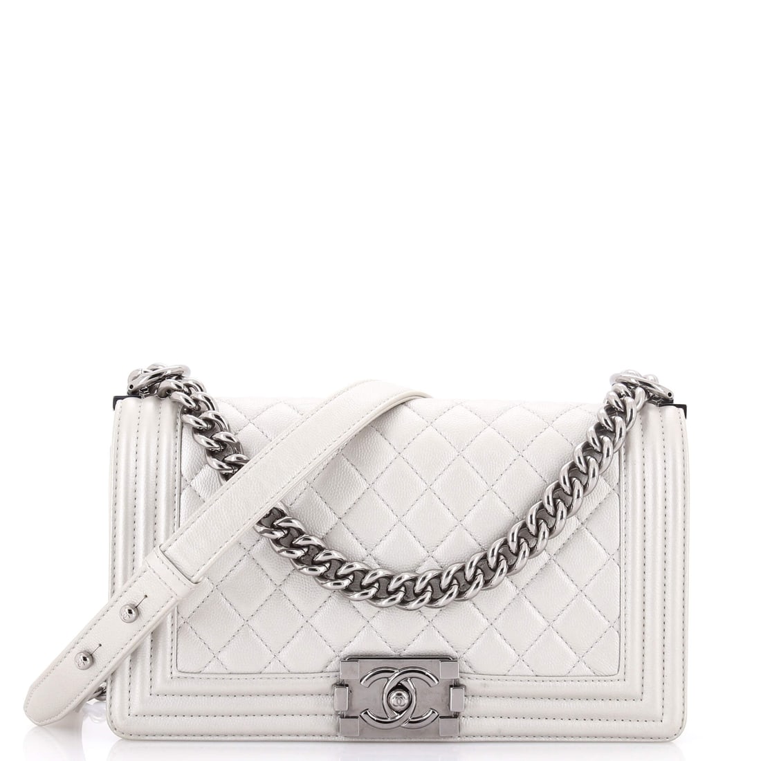 Chanel Boy Flap Bag Quilted Metallic Caviar: Metallic caviar is a tougher surface than it looks, the pebbling diffusing light so the shine reads as sheen rather than mirror. At Old Medium, 10 by 6 by 3 inches, the Boy sits at its most balanced, 
