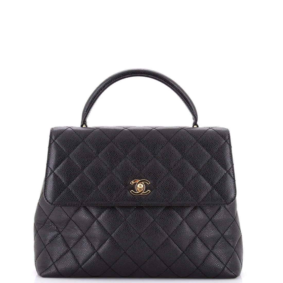 Chanel Vintage Classic Top Handle Flap Bag Quilted Caviar: Quilted caviar from the vintage era has a tighter grain and a firmer hand, and on a Jumbo it keeps the front panel from bowing. This one measures 11.5 by 9 by 5 inches, with both the top handle and th