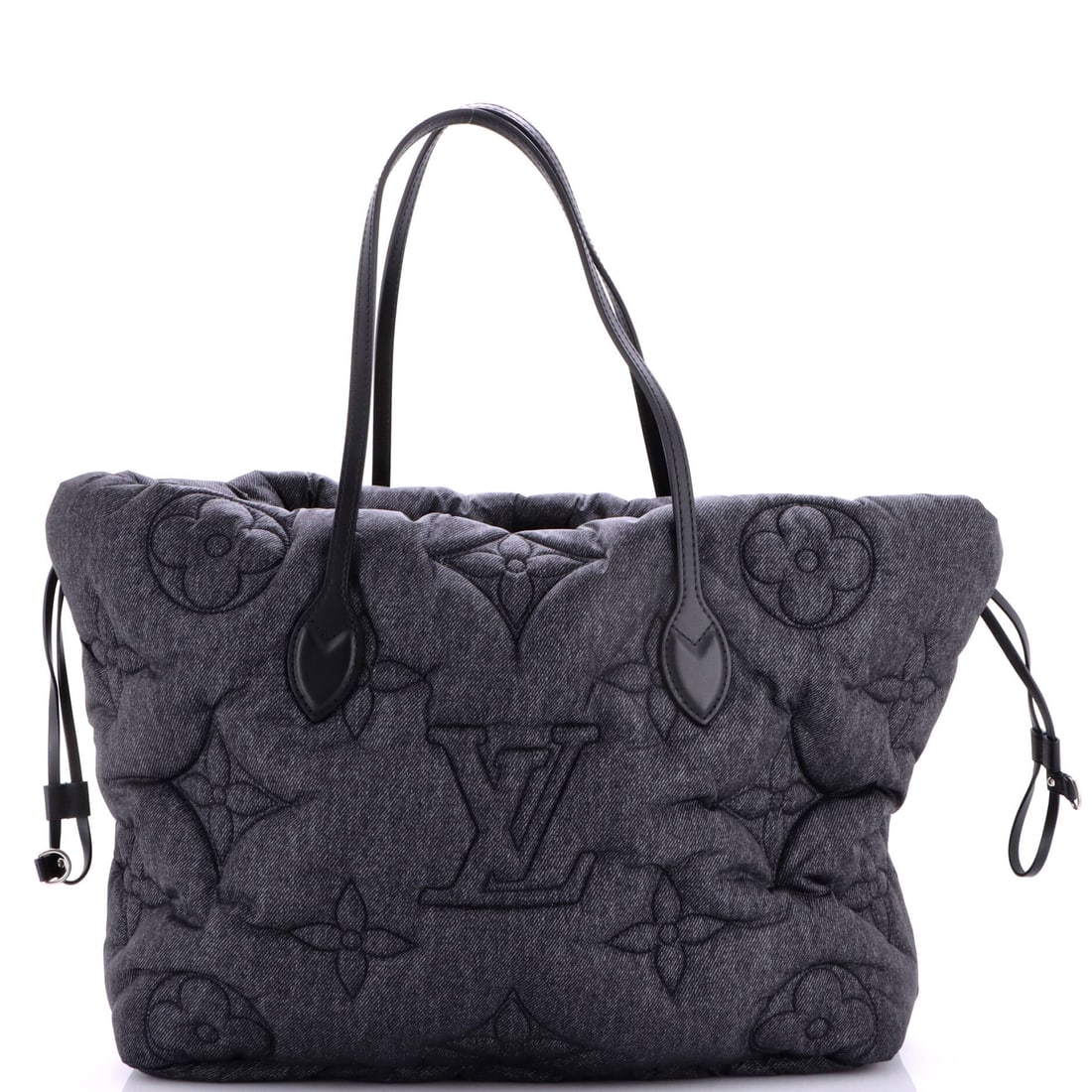 Louis Vuitton Neverfull Inside Out Monogram Puffygram: The Puffygram treatment inflates the Neverfull's monogram canvas into a padded, quilted surface, and the inside-out construction puts the lining on show. MM is the size that made the Neverfull ubiquit