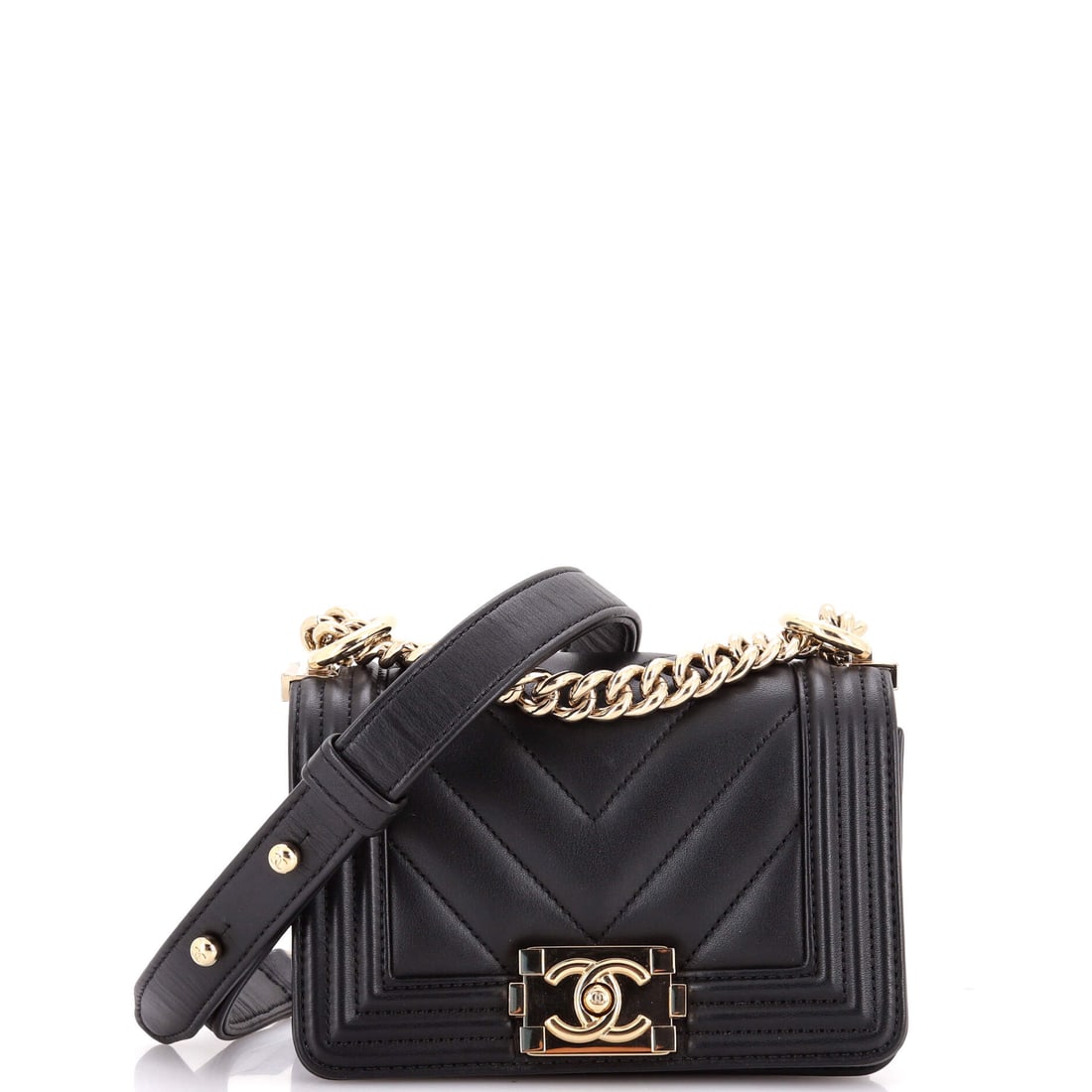 Chanel Boy Flap Bag Chevron Lambskin: Chevron lambskin does something different on a Mini than on the bigger Boys: the V lines make a small bag look deliberate rather than dainty. This one runs 6 by 4 by 2.5 inches with the full boy-lock 