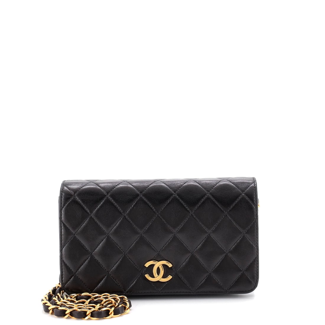 Chanel Vintage Full Flap Bag Quilted Lambskin: The smaller of the two vintage Minis here at 7.5 in wide, 4.5 in high and just 1 in deep, this one is flat enough to read as a shoulder pouch. Full flap, quilted lambskin and a period chain are the wh