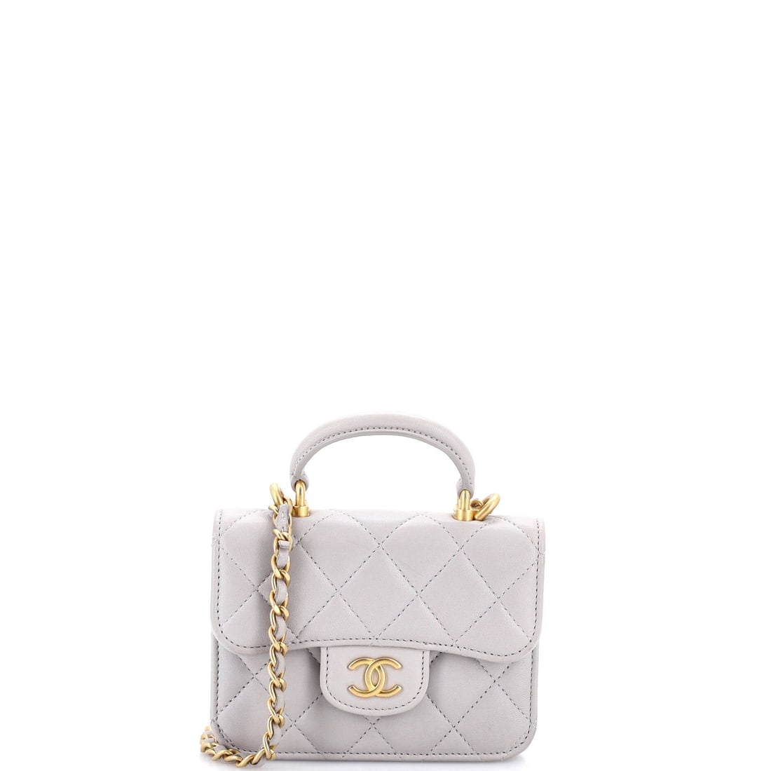 Chanel Top Handle Flap Coin Purse with Chain Quilted Lambskin: Compact at 4.5 by 3.5 by 1.5 inches, this quilted lambskin coin purse pairs a chain with a top handle rather than choosing between them. The flap opening keeps it in the Chanel idiom instead of readin
