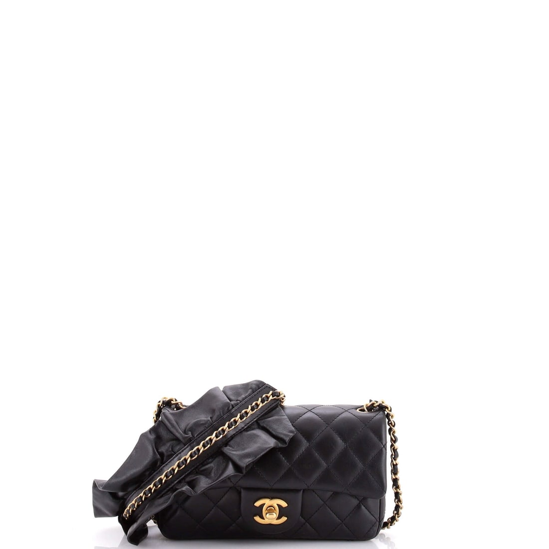 Chanel Romance Flap Bag Quilted Lambskin: The Romance flap is one of Chanel's softer seasonal designs, and lambskin is the right leather for it. Mini scale here, 7.5 inches wide, 5 high and a fairly generous 3 inch depth, so it holds more