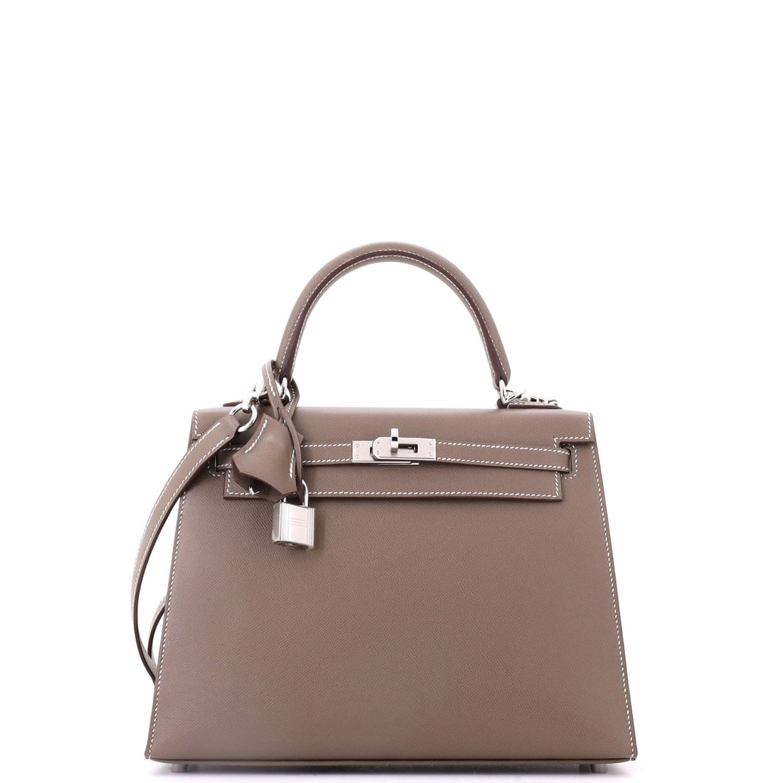 Hermes Kelly Handbag Grey Madame with Palladium Hardware: Madame leather is used sparingly by Hermes and gives this grey Kelly a firm, almost architectural surface that holds the sellier lines beautifully. Palladium hardware keeps the palette cool throughout