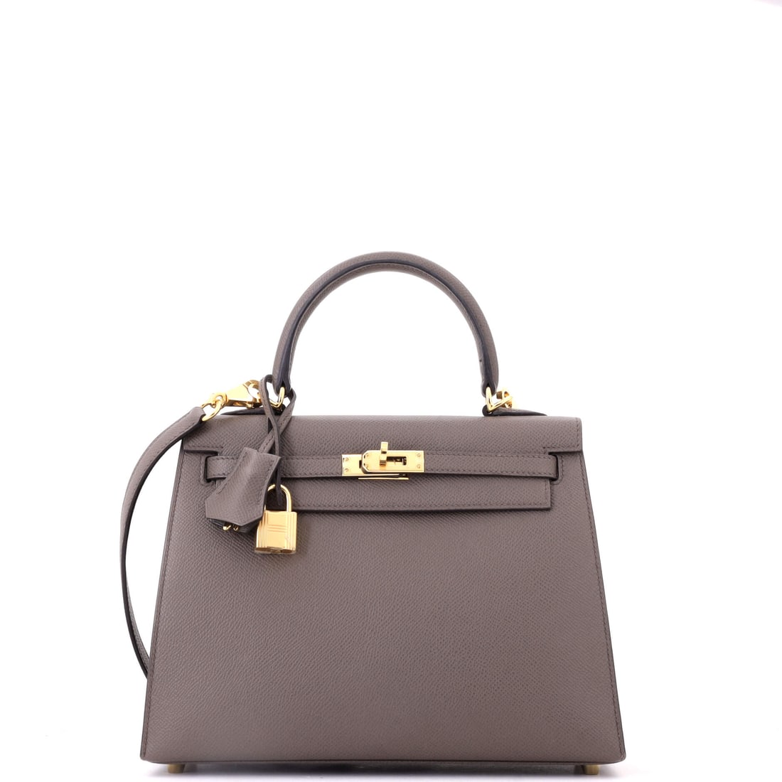 Hermes Kelly Handbag Grey Epsom with Gold Hardware: Grey Epsom Kelly with gold hardware, a combination that softens the cool leather without losing its restraint. The pressed grain keeps the flap and corners sharp, which is where wear shows first on th