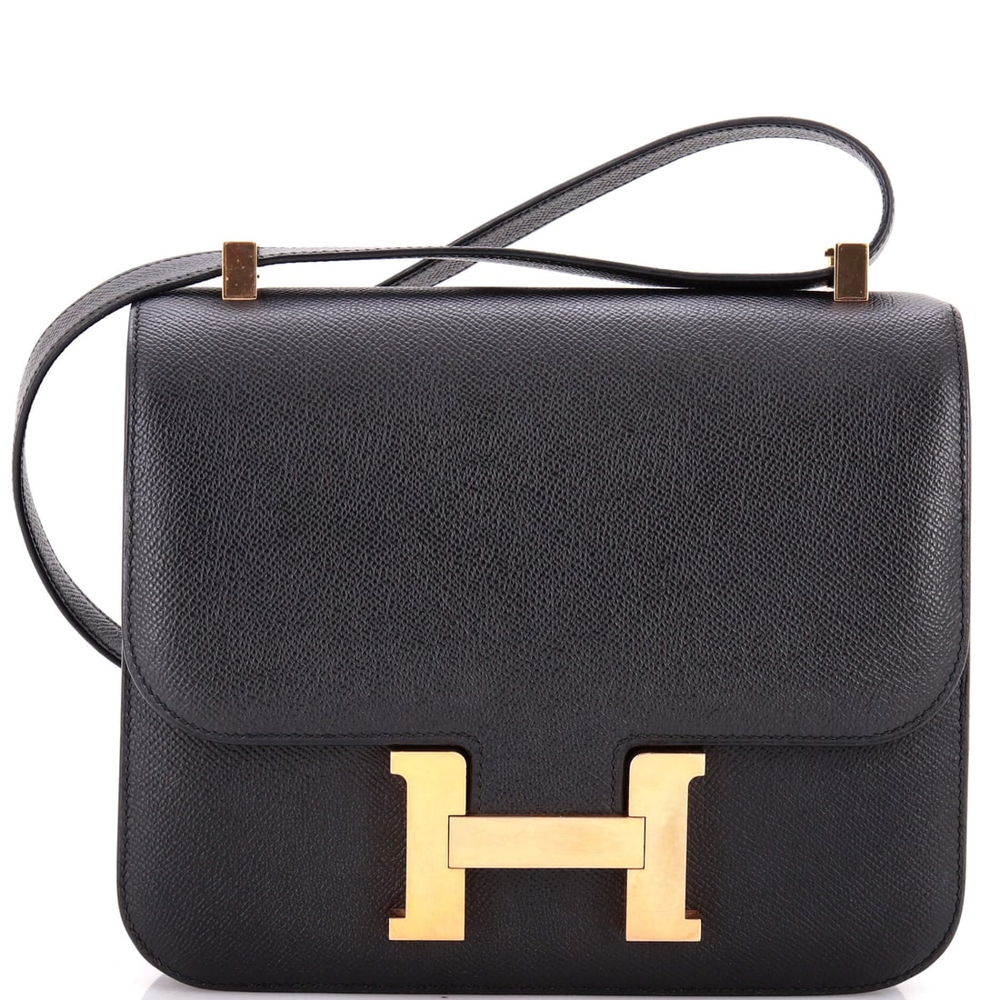 Hermes Constance Bag Epsom: The Constance is the most graphic bag Hermes makes, defined entirely by the oversized H clasp across the front. Epsom leather is the natural pairing, keeping the flap flat and the clasp aligned.