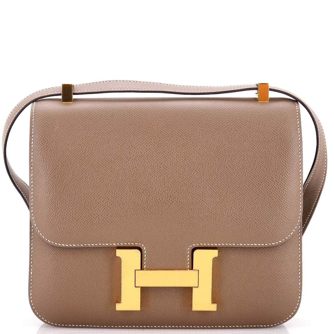 Hermes Constance Bag Epsom: Epsom suits the Constance better than any other leather, holding the flat front panel taut behind the H clasp. This example measures 9 in wide, 8 in high and 3 in deep, with the adjustable strap that 