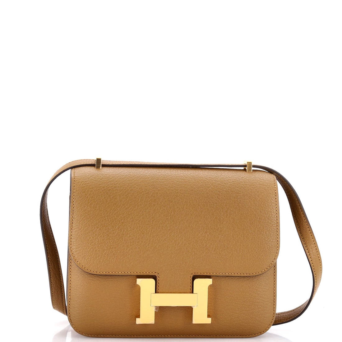 Hermes Constance NM Bag Chevre Mysore: Chevre Mysore on a small Constance is an unusual pairing, the goatskin's fine grain catching light across a front panel that is mostly clasp. Measures 7 in wide, 6 in high and 2 in deep. Grade A - Pri