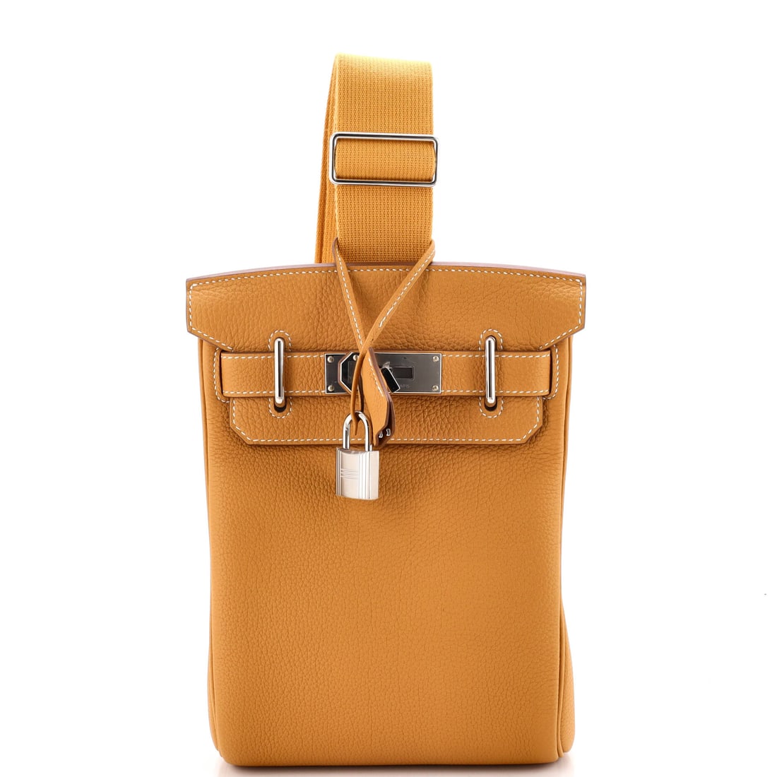 Hermes Hac a Dos Backpack Togo: The Hac a Dos takes the HAC's proportions and turns them vertical, giving Hermes its most credible backpack. Togo is the right leather for a bag meant to be worn on the shoulders. Measures 7 in wide, 