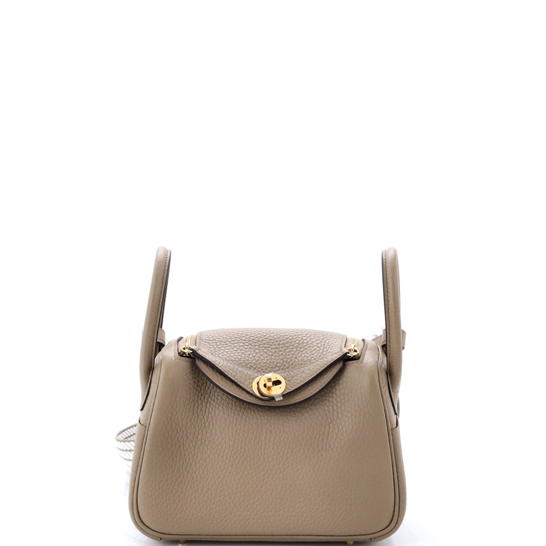 Hermes Lindy Bag Clemence: The Lindy is the most relaxed bag Hermes makes, with twin handles, a double-sided body and none of the ceremony of a Kelly. Clemence suits it exactly, giving the shape its characteristic slump. Small 
