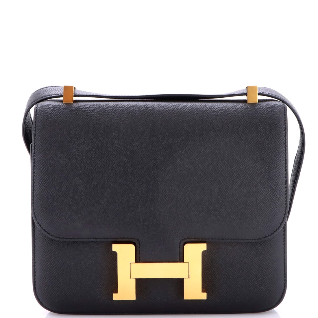 Hermes Constance Bag Epsom: A Constance in Epsom, 9 in wide, 8 in high and 3 in deep, with the convertible strap and the oversized H that carries the whole design. Pressed grain is what keeps the front panel flat behind the clas