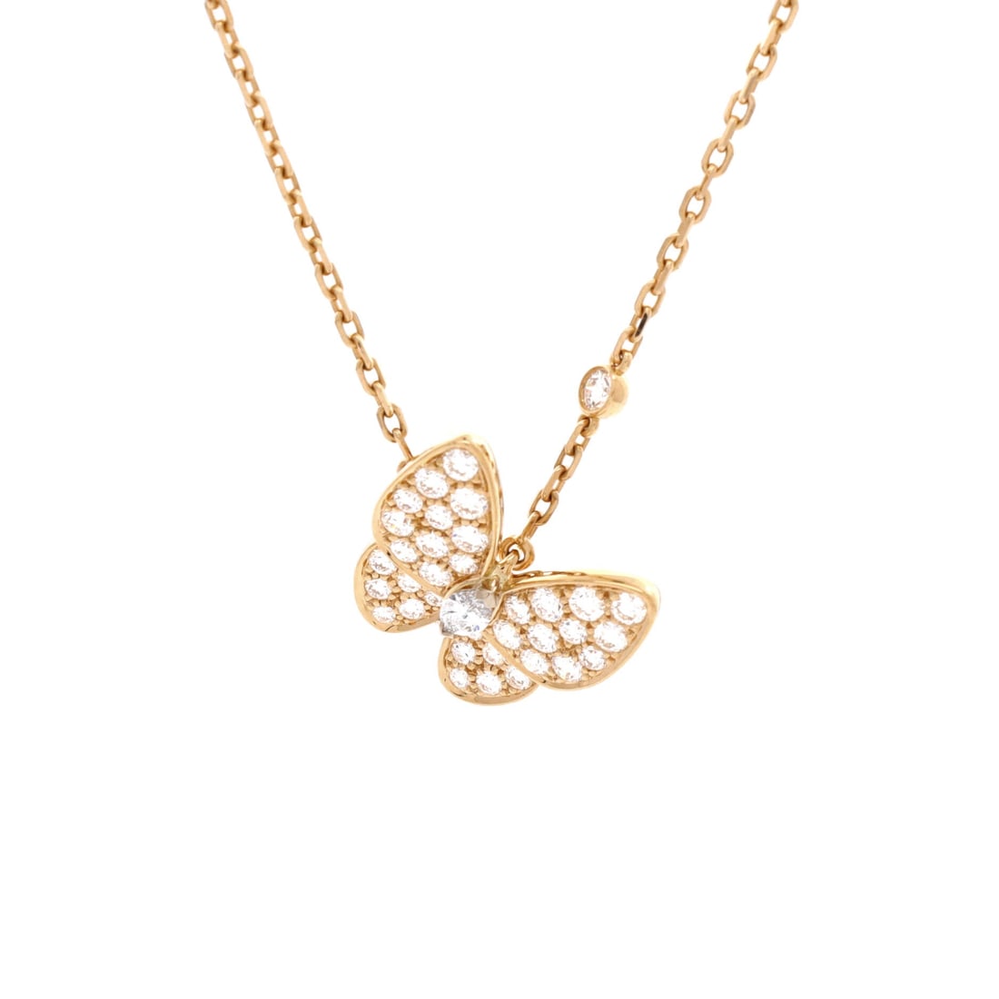 Van Cleef & Arpels Two Butterfly Pendant Necklace 18K Yellow Gold with Diamonds: Van Cleef & Arpels butterflies have become the house's second signature after the Alhambra, and this pendant pairs two of them in 18K yellow gold with diamonds. The asymmetry of the design is what kee