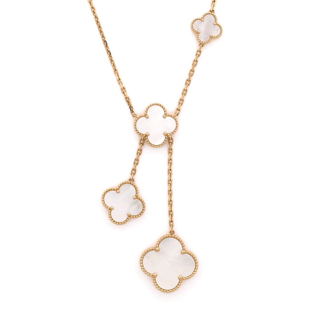 Van Cleef & Arpels Magic Alhambra 6 Motifs Necklace 18K Yellow Gold and Mother of Pearl: Mother of pearl is the material most associated with the Alhambra, and this Magic six-motif necklace sets it in 18K yellow gold across motifs of varying size. The scale differences are what separate t