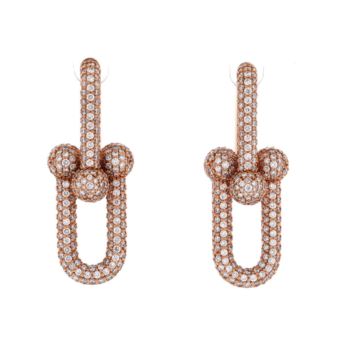 Tiffany & Co. Hardwear Link Earrings 18K Rose Gold with Pave Diamonds: The HardWear collection came out of Tiffany's archive of industrial chain designs, and these link earrings in 18K rose gold with pave diamonds carry that weight at ear scale. The graduated link is the