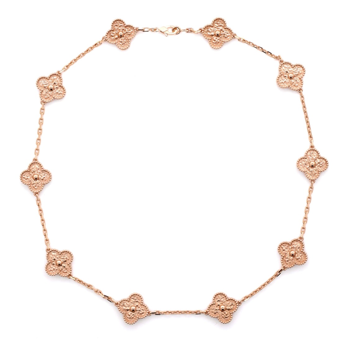Van Cleef & Arpels Vintage Alhambra 10 Motifs Necklace 18K Rose Gold: Ten motifs of Vintage Alhambra in 18K rose gold, the necklace length that has carried the line for six decades. Grade C - Very Good, so the motifs, beading and clasp merit a close look. Maison de Beau