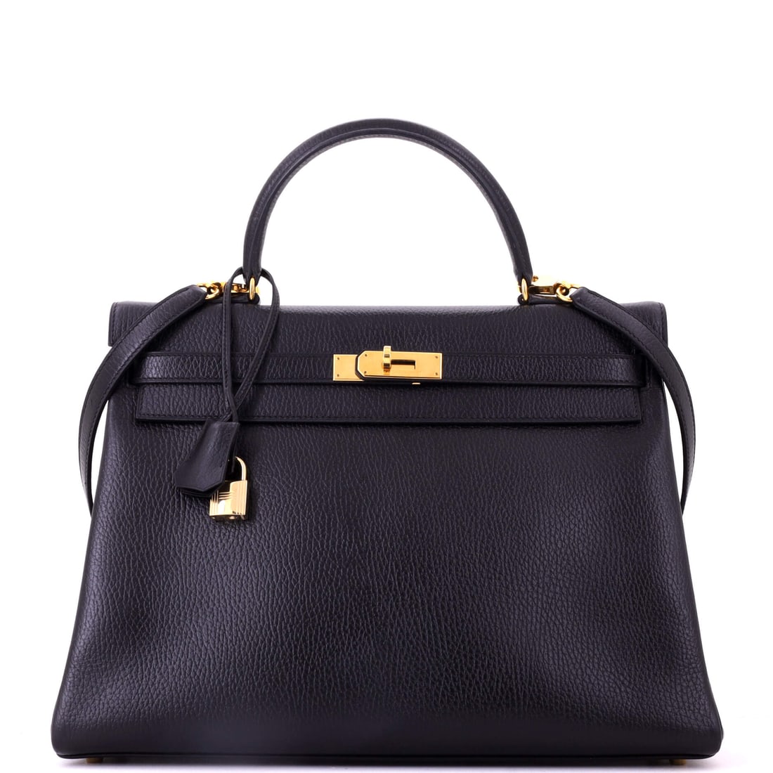 Hermes Kelly Handbag Black Ardennes with Gold Hardware: Ardennes is a discontinued grained leather, heavier and more weather-resistant than anything in current production, and it dates this black Kelly to an earlier era of the house. Measures 13.5 in