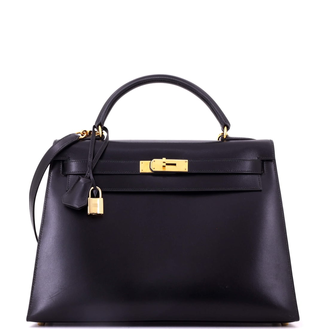 Hermes Kelly Handbag Black Box Calf with Gold Hardware: A 13 in wide black Box Calf Kelly, 9 in high and 4 in deep, with gold hardware. The traditional specification at a generous width. Shows as Grade C - Very Good. Maison de Beaubigonne authenticity guar