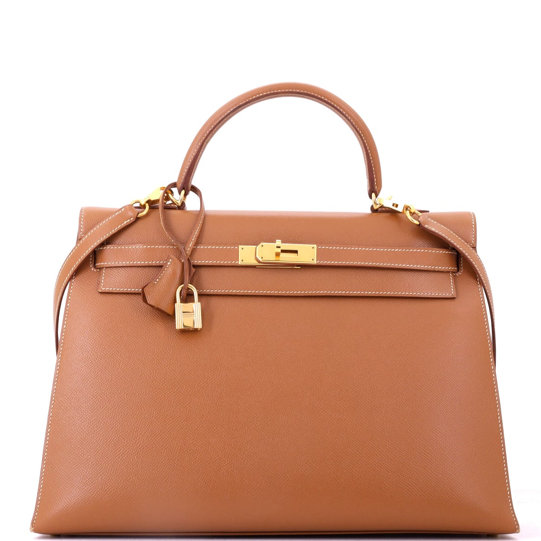 Hermes Kelly Handbag Brown Courchevel with Gold Hardware: Courchevel was retired before Epsom took its place, and this brown Kelly at 14 in wide, 10 in high and 5 in deep belongs to that earlier chapter. Gold hardware throughout. Grade C - Very Good. Maison