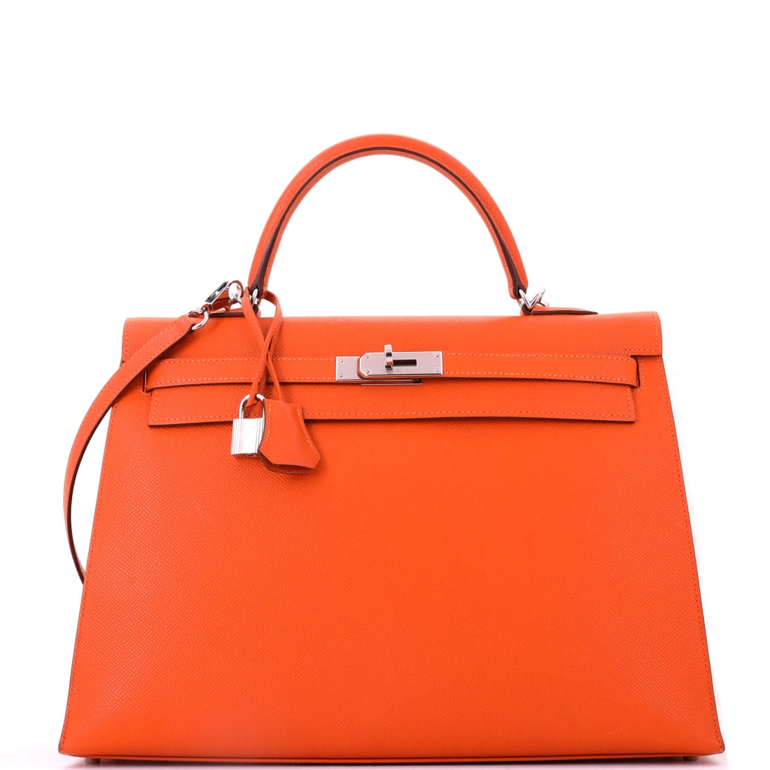 Hermes Kelly Handbag Orange Epsom with Palladium Hardware: Orange Epsom Kelly with palladium hardware in the large 14 in width, 10 in high and 5 in deep. The house color at a scale Hermes builds rarely. Shows as Grade C - Very Good. Maison de Beaubigonne