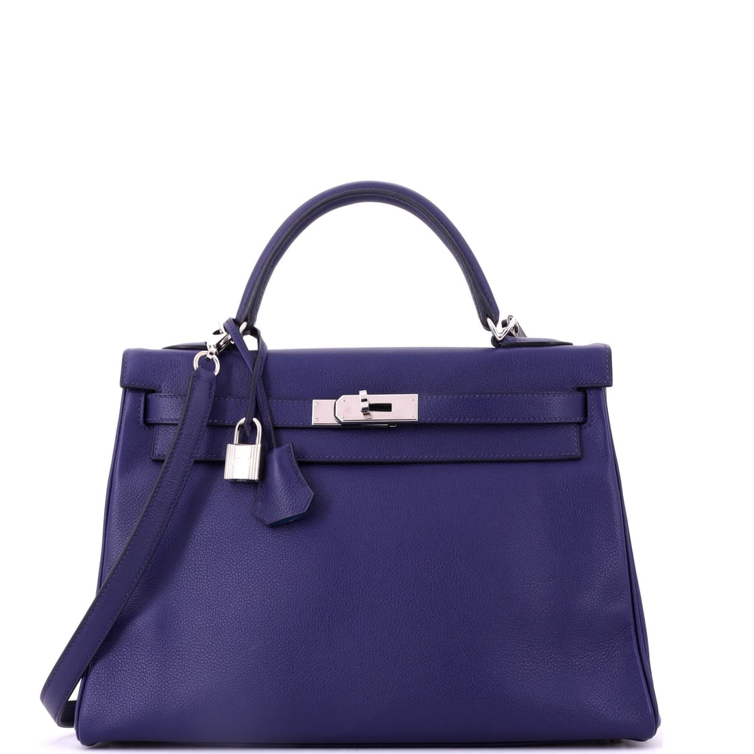 Hermes Kelly Handbag Verso Evercolor with Palladium Hardware: A Verso Evercolor Kelly with palladium hardware, 12 in wide, 9 in high and 4 in deep. Smooth exterior, contrast interior and a width that carries documents. Grade C - Very Good. Maison de Beaubigonne 