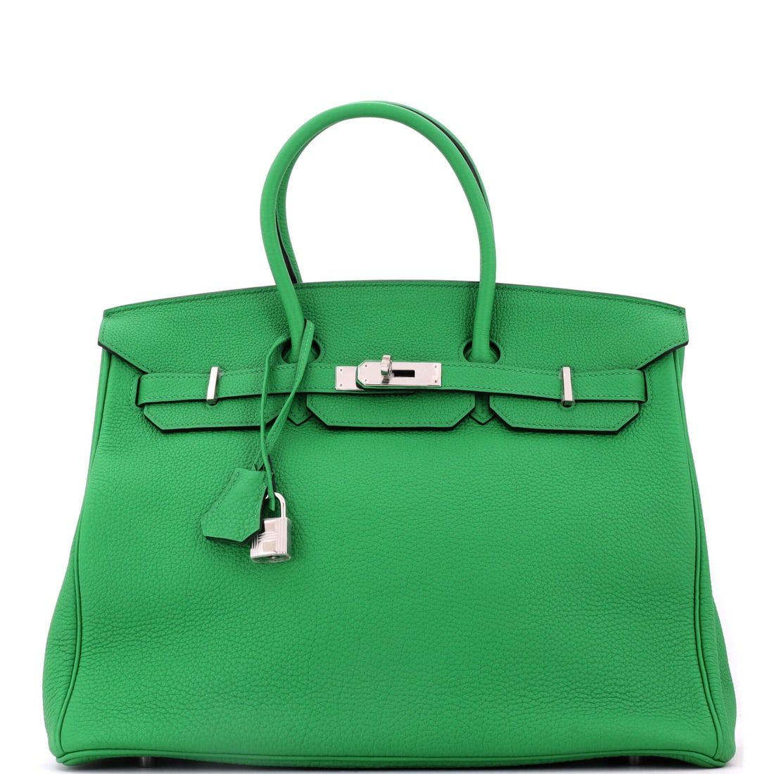 Hermes Birkin Handbag Green Togo with Palladium Hardware: A green Togo Birkin with palladium hardware, 13.5 in wide, 10 in high and 7 in deep. Color at travel scale, kept cool by the fittings, on a Birkin built to carry a week. Grade C - Very Good. Maison de