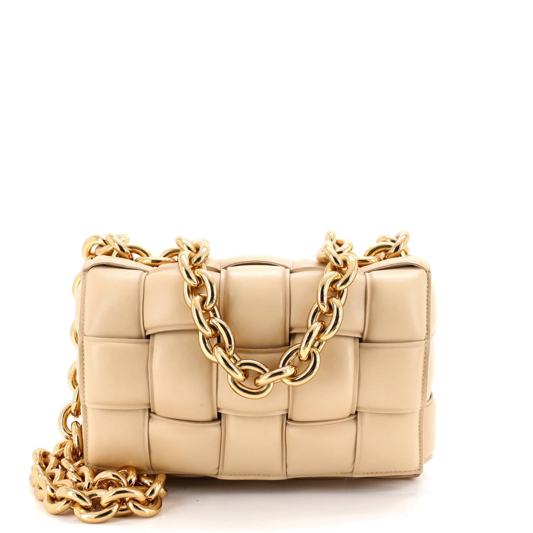 Bottega Veneta Cassette Chain Crossbody Bag Padded Maxi Intrecciato Leather: The Bottega Veneta Cassette Chain Crossbody Bag, cut in Padded Maxi Intrecciato Leather, oversized Intrecciato weaving on a compact structured body. Bottega's argument has always been that the weave i