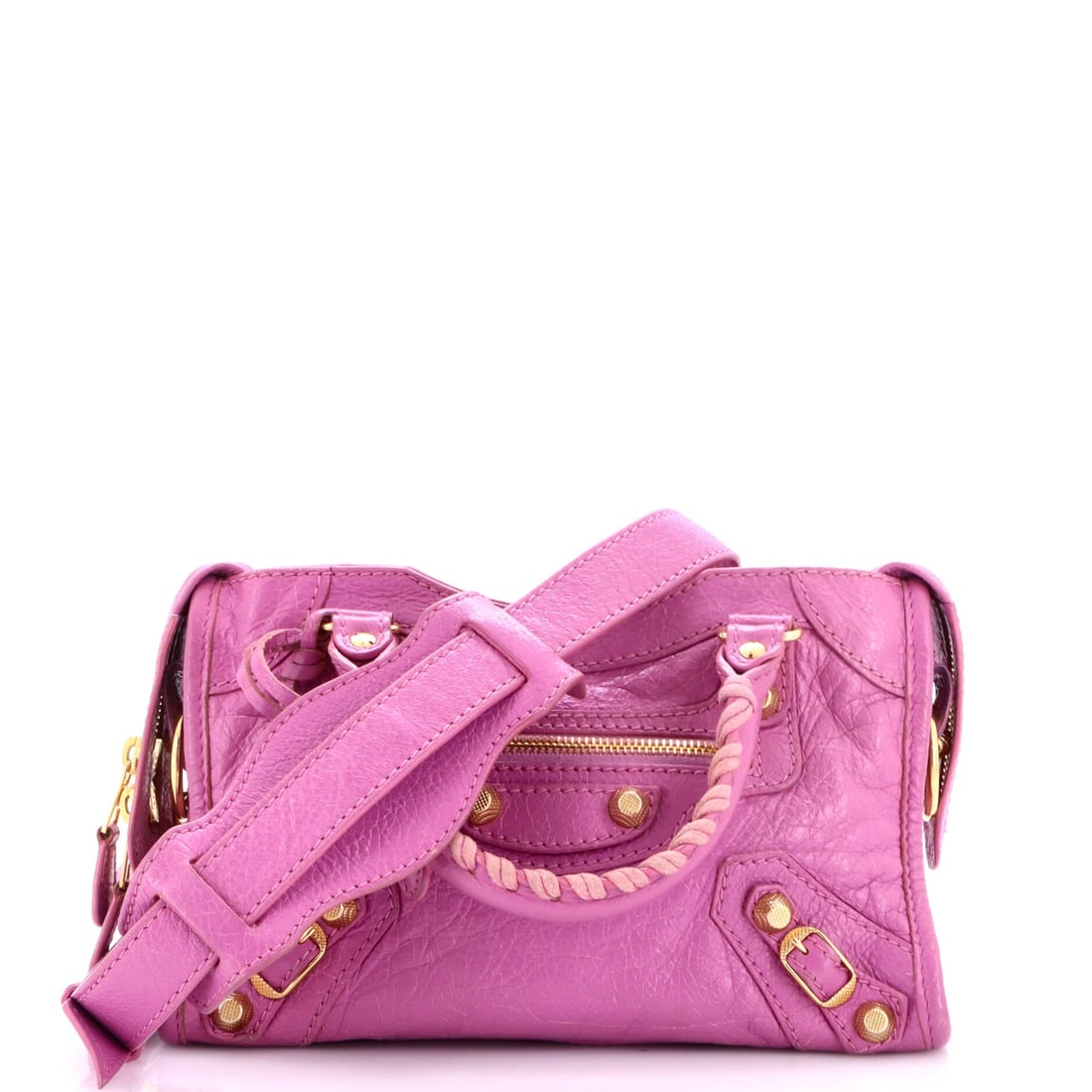 Balenciaga City Giant Studs Bag Leather: City Giant Studs Bag in Leather: a slouched leather body with a fold-over top and buckled straps. City hardware ages visibly, and the finish on the studs is worth a close look. Measures 9.5" W x 6" H 