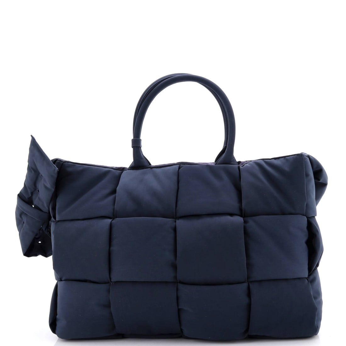Bottega Veneta Arco Tote Maxi Intrecciato Nylon: Arco Tote, Bottega Veneta, Maxi Intrecciato Nylon - a wide woven tote with a shallow base and a triangular profile. Wide weave across a large panel is the hardest thing to execute cleanly, which is