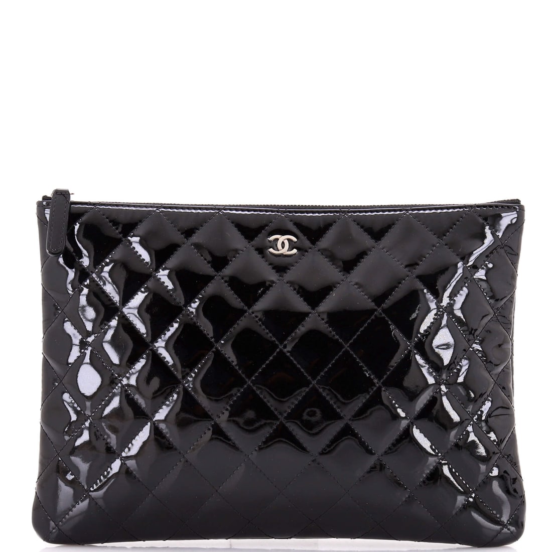 Chanel O Case Clutch Quilted Patent: Chanel's O Case Clutch arrives in Quilted Patent, a slim rectangular quilted case with a wraparound zip. Quilting alignment across the panel is the detail that separates a strong example. The body mea