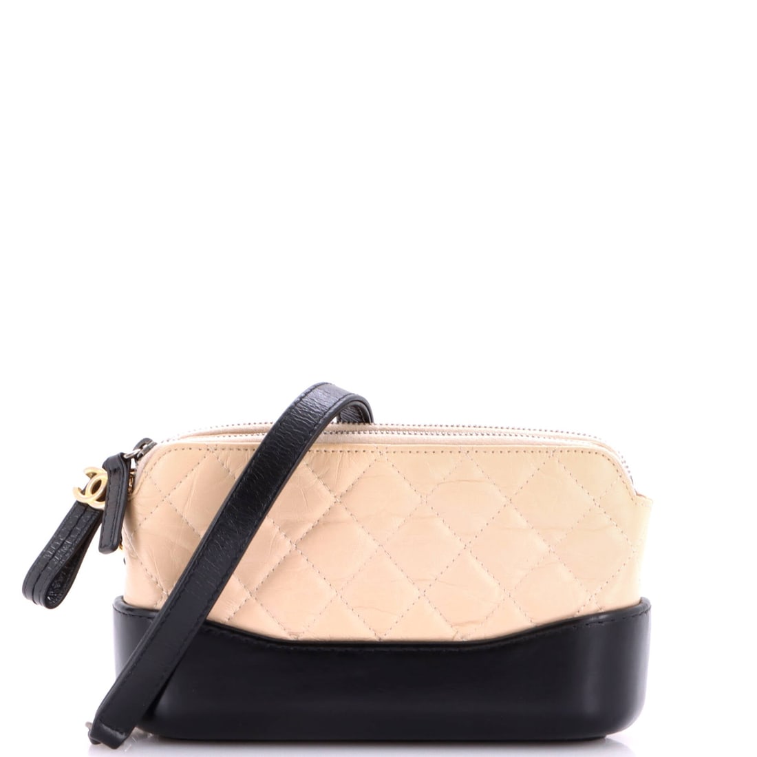 Chanel Gabrielle Double Zip Clutch with Chain Quilted Aged Calfskin: Gabrielle Double Zip Clutch with Chain in Quilted Aged Calfskin: a two-tone body with a chain-and-leather strap and a soft gathered top. The Gabrielle was built to be worn four ways, and the strap sys